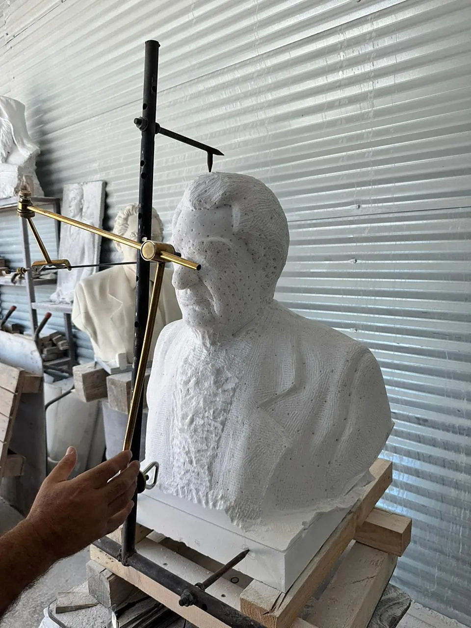 Marble bust in the carving bay, roughed out and awaiting finishing